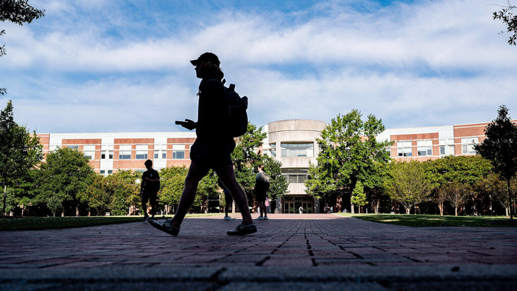 Engineering students walking to classes on Centennial Campus at NC State.