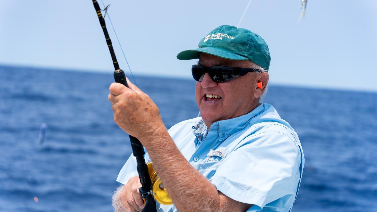 Sport Fishing School - June 2025 - man casting a rod